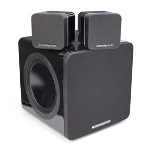 The Cambridge Audio Minx S212 2.1 Stereo Speaker System features a minimalist, boxy design with two compact satellite speakers placed on top of a larger subwoofer unit.