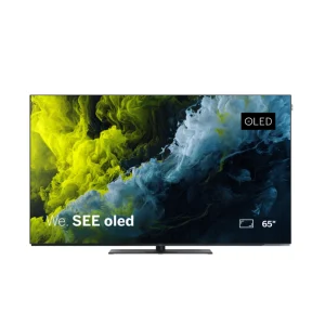 Loewe We. SEE 65 OLED TV displaying colourful smoke artwork with OLED branding and 65-inch screen size.