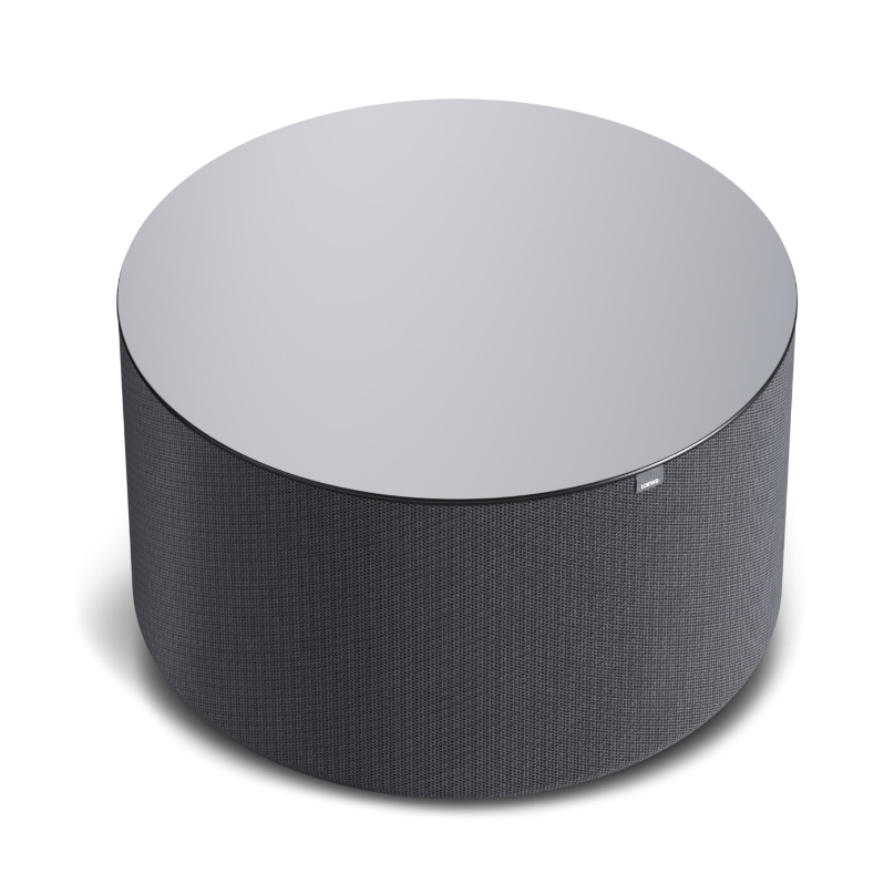 Loewe Klang Bar5 Mr &Amp; Sub5 Soundbar And Subwoofer Loewe klang sub5 wireless subwoofer shown from above with a rounded cylindrical design and black fabric grille.